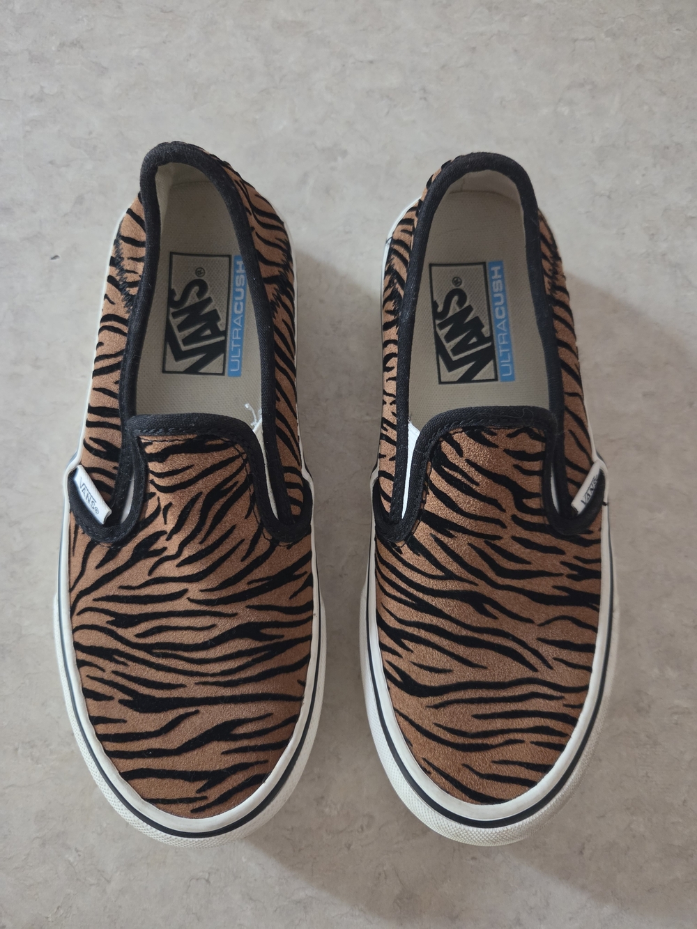 Vans Kids Slip-On Sneakers in Black and Brown Tiger Stripe